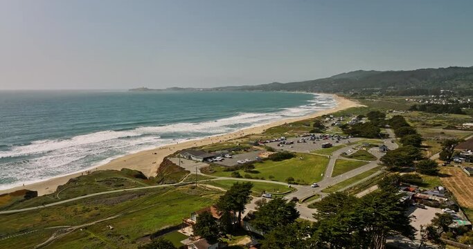 Half Moon Bay California Aerial v3 flyover francis beach campground state park capturing summer seascape of swelling surf and rip currents waves crashing the shore - Shot with Mavic 3 Cine - May 2022