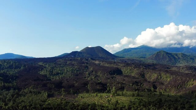 DRONE SHOT OF PARICUTIN VOLCANO AT NOON WITH CLOUDS