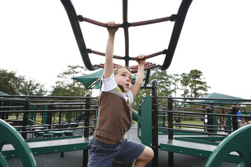 Boy on Monkey Bars