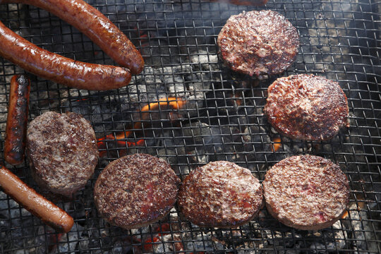 Close-up of Burgers and Hot Dogs on the Barbecue, Houston, Texas, USA