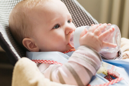 Baby Drinking From Bottle