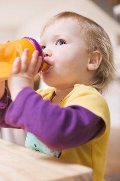 Baby Girl Drinking from Spill Proof Cup