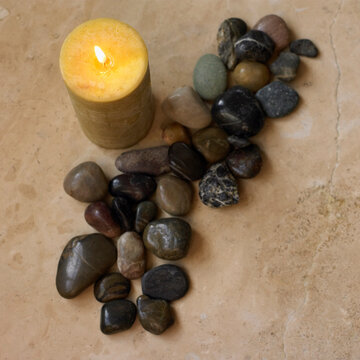 Still Life of Candle and Pebbles