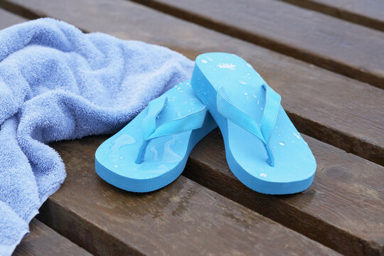 Flip Flops and Towel on Dock