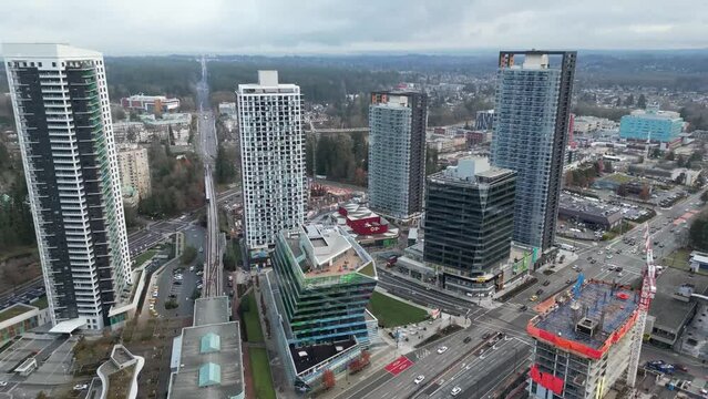 Aerial drone shot of King George Hub mix-use architecture development  in Surrey, British Columbia, in downtown core of  Surrey City Centre district.