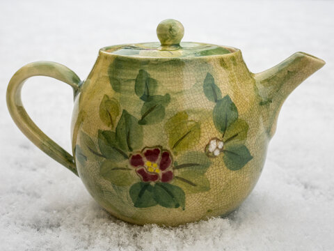 Handmade Japanese porcelain Kyo-yaki tea pot (Kyo-yaki or Kyo ware is a traditional pottery style from Kyoto, Japan)