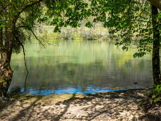 A small shaded beach on the Seine River