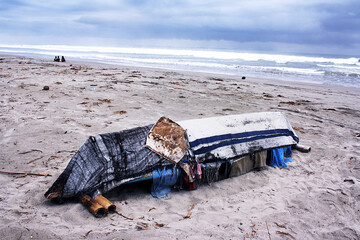 overturned boat on the beach