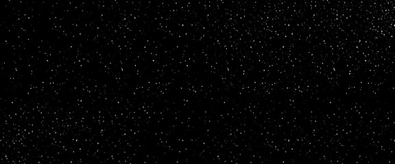Flying dust particles on a black background, abstract real dust floating over black background for overlay, night sky graphic resources star on snow effect background 
