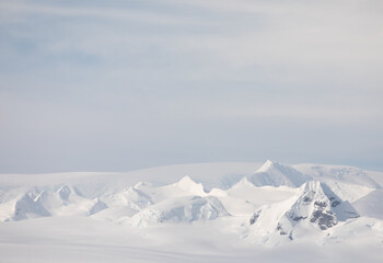 Fototapeta na wymiar Grand landscape of mountains and snow in Antarctica.