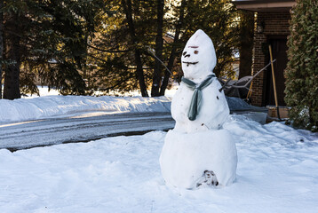snowman  with a wool scarf