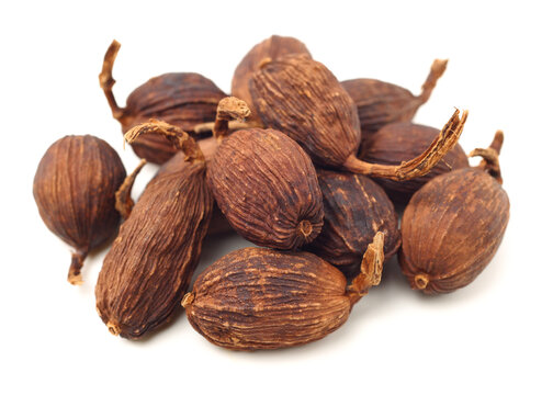 Black cardamom on a white background 
