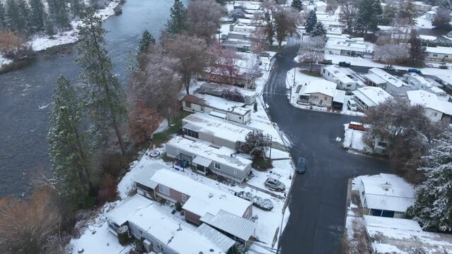 Aerial view of a mobile home park overlooking the Spokane River.