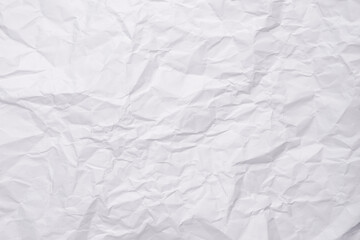 White crumpled paper texture background, clean white wrinkled paper, top view.