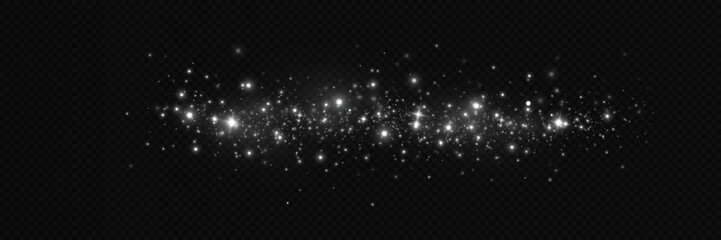 Particles of white magic dust. Shining light particles.Christmas glitter particles. Light effect on a transparent background