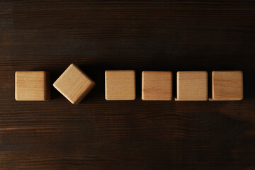 Blank wooden cubes for different concepts, top view