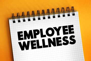 Employee Wellness - activities and programs aim to improve employee health and well-being, text concept on notepad