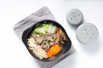 Bulgogi Jeongol or Yaetnal Bulgogi is Korean traditional stew with beef in Ttukbaegi (Bulgogi Hot Pot)