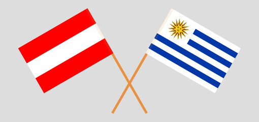 Crossed flags of Austria and Uruguay. Official colors. Correct proportion