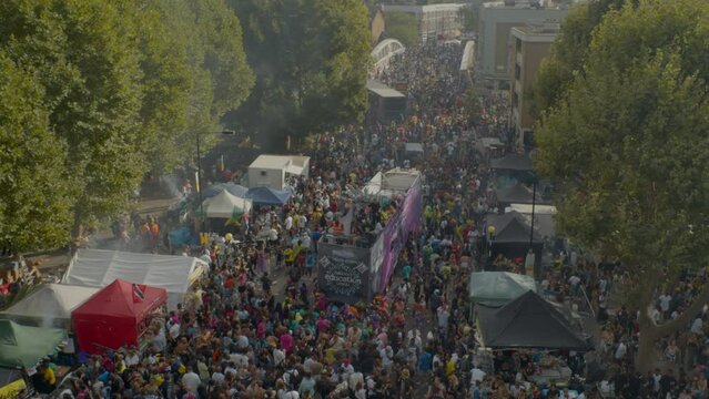 Aerial view crowds and people in the street at Notting Hill Carnival