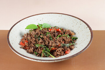 Pad Kra Pao is a Thai holy basil stir fry with ground beef. 