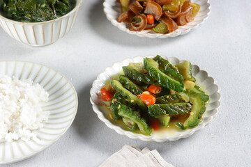 Tumis Pare or Oseng Pare is Stir-Fried Bitter Gourd, a typical Indonesian home dish