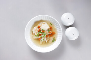 Sup Ikan Goji Berry is Fish Soup with Goji Berry served in a bowl.