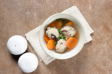 Sup Bakso Lohoa or Bakso Rambutan  is Lohoa Meatballs made from  minced meat, mushroom and glass noodles.