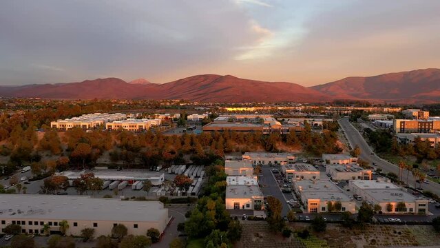 Commercial buildings in Chula Vista, a suburb of San Diego California. Drone backwards.
