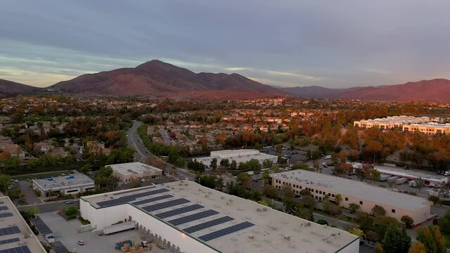 Industrial park and infrastructure in Eastlake Chula Vista, California. Drone flight at dusk.
