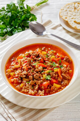 Hamburger Soup with barley and vegetables in bowl