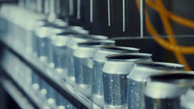Can conveyor belt beverage manufacturing. Automatic Filling line for drink cans.