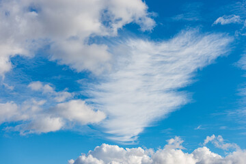 Photography of beautiful cumulus clouds or cumulonimbus and cirrocumulus white clouds, against a...