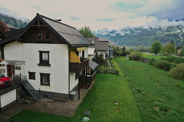 Fototapeta na wymiar View of the yard of the house from balcony at mountain Austria.