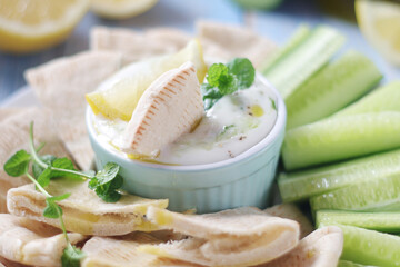 Tzatziki, Greek dip sauce with pita and cucumbers