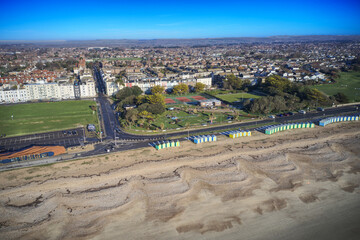 Littlehampton East Beach with Norfolk Gardens in the background, where there is Crazy Golf, Tennis and Bowling. Aerial view.