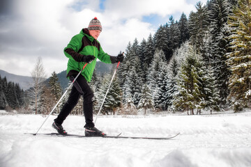 Active senior. Cross-country skiing. Winter sport activities