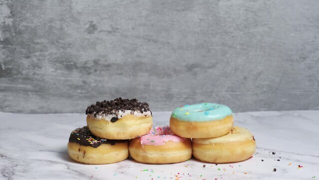 children hand takes a donut