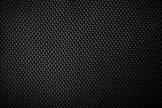 Abstract Black carbon fiber texture seamless for background. material wallpaper used cover for car tuning service. pattern for web backdrop or text background.