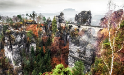 Bastei bridge and autumn forest in Saxon Switzerland, Germany