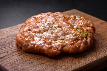 Delicious fresh grilled turkey meat steak with spices and herbs