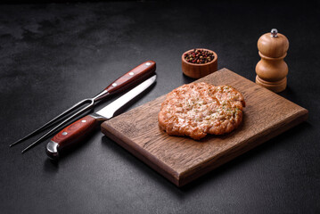 Delicious fresh grilled turkey meat steak with spices and herbs