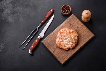 Delicious fresh grilled turkey meat steak with spices and herbs