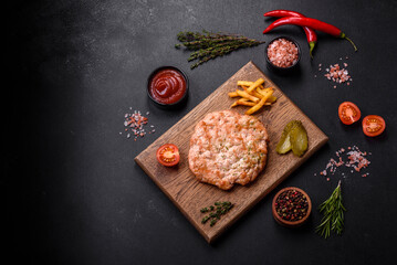 Delicious fresh grilled turkey meat steak with spices and herbs