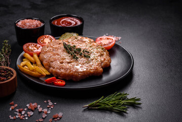 Delicious fresh grilled turkey meat steak with spices and herbs