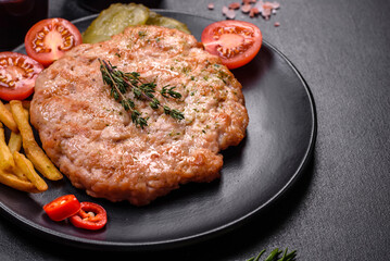 Delicious fresh grilled turkey meat steak with spices and herbs