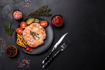 Delicious fresh grilled turkey meat steak with spices and herbs