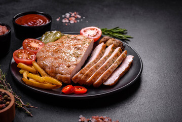 Delicious fresh grilled turkey meat steak with spices and herbs