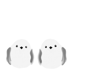 仲良く寄り添うシマエナガ