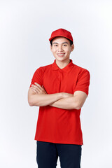 Smiling friendly-looking asian delivery guy in blue uniform cross arms and looking confident, standing white background ready to help, bring order to client